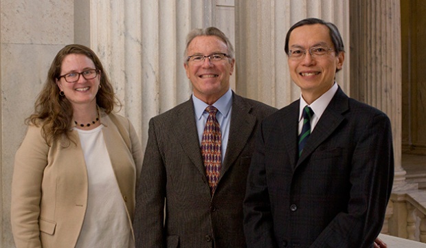 Dr. Christopher King (center) with Valerie Cooley and Kenneth Wong