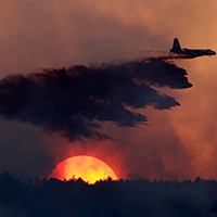 Plane over wildfire