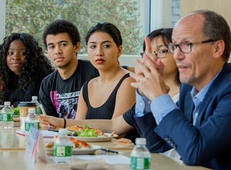 DNC Chair Tom Perez at the Watson Institute, speaking with students