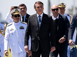 Jair Bolsonaro presiding over a Naval school graduation ceremony