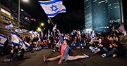 Demonstrators block a highway in Tel Aviv