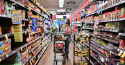 Photo of shopper in grocery store aisle